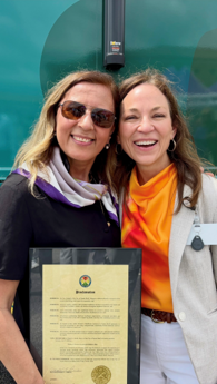 Maria Victoria Ferraris with Mayor Robert L. Smith at the ribbon-cutting